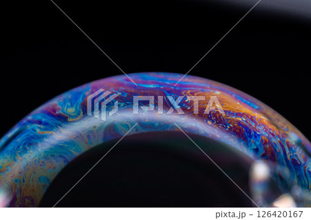 Vibrant soap bubble art close-up studio macro colorful patterns Vibrant soap bubble art close-up studio macro colorful patterns 126420167