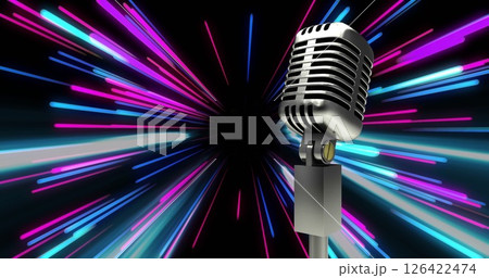 Retro microphone with colorful light streaks image in background Retro microphone with colorful light streaks image in background 126422474