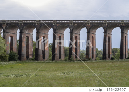 rchitectural splendour of Ouse Valley Viaduct or Balcombe Viaduct (Railway viaduct) carries the Brighton Main Line over the River Ouse in Sussex. 126422497