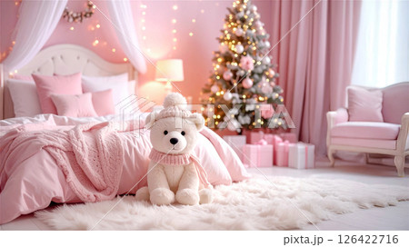 クリスマスの子供部屋のベッドの横の可愛いニット帽をかぶったくまのぬいぐるみ 126422716