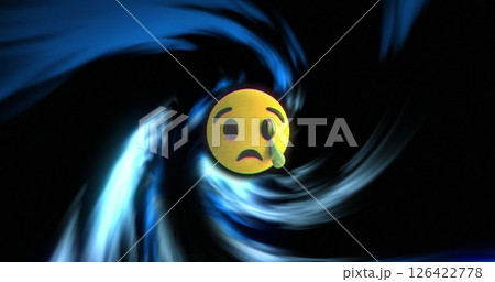 Sad face emoji with tear over swirling blue and black background image Sad face emoji with tear over swirling blue and black background image 126422778