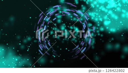 Glowing circular image with blue and purple particles on dark background 126422802