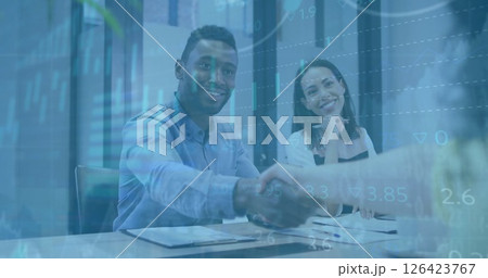 Image of financial data processing over diverse business people in office Image of financial data processing over diverse business people in office 126423767