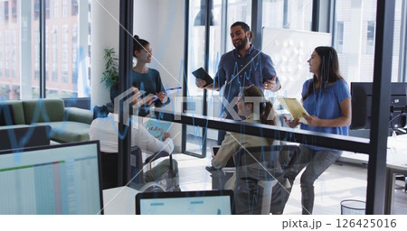 Image of diagrams over diverse business people at meeting Image of diagrams over diverse business people at meeting 126425016