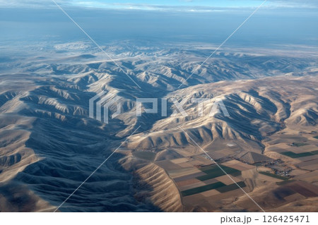 Aerial View of Tan and Brown Mountain Range 126425471