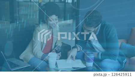 Image of financial data processing over diverse business people in office 126425911