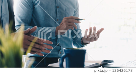 Asian business adviser meeting to analyze and discuss the situation on the financial report in the meeting room.Investment Consultant,Financial advisor and accounting concept Asian business adviser meeting to analyze and discuss the situation on the financial report in the meeting room.Investment Consultant,Financial advisor and accounting concept 126426178
