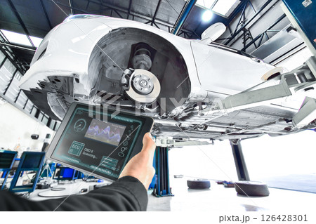 Diagnostic automotive engine system problems with OBD scanner tablet 126428301