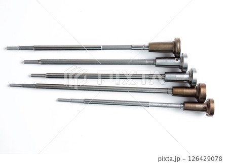 Set of five automotive control valves in horizontal layout on white background. Ideal for product presentation or online parts store. 126429078