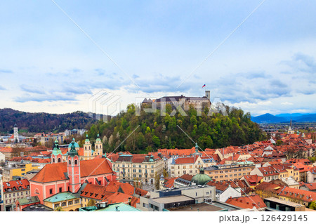 View of the old town and the medieval Ljubljana castle on top of a forest hill in Ljubljana, Slovenia View of the old town and the medieval Ljubljana castle on top of a forest hill in Ljubljana, Slovenia 126429145