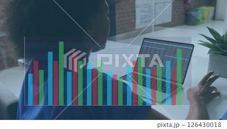 Image of financial data processing over african american businesswoman using laptop in office Image of financial data processing over african american businesswoman using laptop in office 126430018