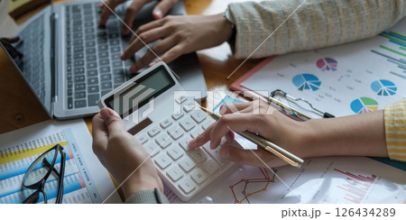 Business colleague team working and analyzing with new project of accounting finance, Idea presentation and meeting strategy plan of financial business investment Business colleague team working and analyzing with new project of accounting finance, Idea presentation and meeting strategy plan of financial business investment 126434289