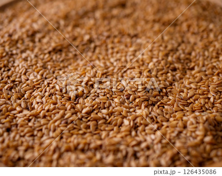 Organic golden flaxseed, linseed grains. Superfood high in fiber. Organic golden flaxseed, linseed grains. Superfood high in fiber. 126435086
