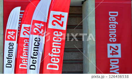 Warsaw, Poland. 7 May 2025. A view of flags with the words Defence24 on them. This is a defence conference held at the PGE National Stadium. Warsaw, Poland. 7 May 2025. A view of flags with the words Defence24 on them. This is a defence conference held at the PGE National Stadium. 126436538