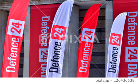 Warsaw, Poland. 7 May 2025. A view of flags with the words Defence24 on them. This is a defence conference held at the PGE National Stadium. Warsaw, Poland. 7 May 2025. A view of flags with the words Defence24 on them. This is a defence conference held at the PGE National Stadium. 126436539