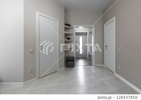 Modern Bright Hallway with Built-in Shelves 126437850
