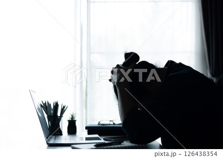Businesswoman faced challenging problem at office, navigating work stress and using her computer to find solutions amidst feelings of depression. problem, woman, job, business, stress, depression. 126438354