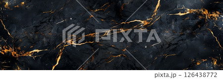 Deep black marble features exquisite golden veins that weave through its surface, providing a visual delight ideal for upscale decor or interiors 126438772