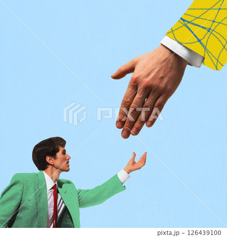 Creative collage. Businessman in green suit reaches for large extended hand in yellow sleeve. 126439100