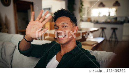 Man, wave and live streaming in home with portrait, influencer or content creation with greeting in picture. Video call, selfie and person with memory, update or hello for broadcast on social media 126439261