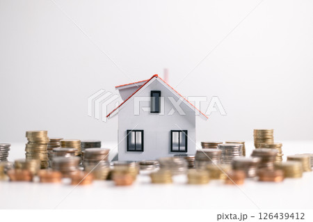 Investment in a home often involves securing a mortgage loan, with a finance agent helping to manage business and property aspects of the house to ensure best use of your money. investment, loan. Investment in a home often involves securing a mortgage loan, with a finance agent helping to manage business and property aspects of the house to ensure best use of your money. investment, loan. 126439412