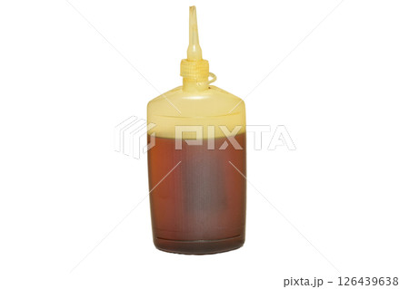 A bottle of machine oil. 126439638