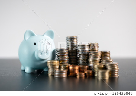 Stack of coins symbolizes core principles of finance, from saving and investment to business and banking, reflecting vital role currency plays in economy and management of money. finance, investment. 126439849