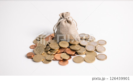Stack of coins symbolizes core principles of finance, from saving and investment to business and banking, reflecting vital role currency plays in economy and management of money. finance, investment. 126439901