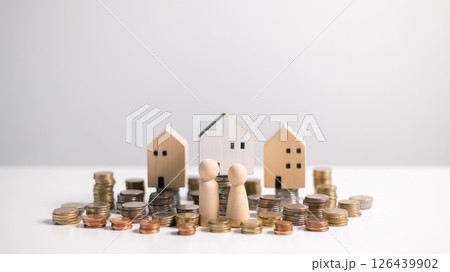 Securing a loan for a house is a fundamental financial concept in the business of real estate, involving significant money management and investment strategies to turn a home into a long-term asset. 126439902