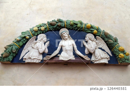Christ in Pieta with two angels in Adoration, lunette, bas relief by Andrea della Robbia from Medici Chapel, Basilica di Santa Croce (Basilica of the Holy Cross) in Florence, Italy Christ in Pieta with two angels in Adoration, lunette, bas relief by Andrea della Robbia from Medici Chapel, Basilica di Santa Croce (Basilica of the Holy Cross) in Florence, Italy 126440381