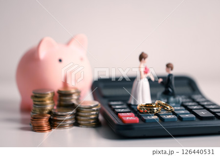 Save money for a wedding, wise to manage your finance by investing in gold, utilizing banking services, and understanding the broader economy and currency business, even down to every last coin. 126440531