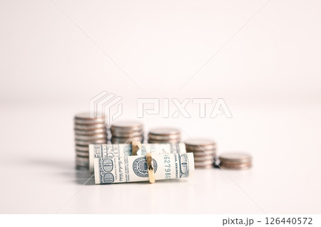 Woman carefully manages her wedding fund, making payments from her bank account and using credit wisely, with the background of sound financial plan supporting her marriage and business commitments. 126440572