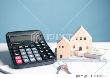 Concept of saving money for loan can help reduce debt when buy house or home, while understanding bank equity is essential for any business investment. loan, money, house, home, bank, debt, concept. 126440627