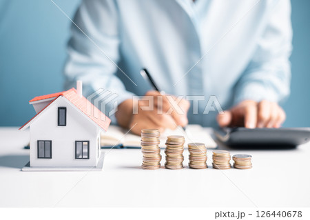 Woman decided to save money for house by managing her finances wisely and viewing her home as crucial investment in her future business endeavors. woman, save, money, house, finance, home, saving. Woman decided to save money for house by managing her finances wisely and viewing her home as crucial investment in her future business endeavors. woman, save, money, house, finance, home, saving. 126440678