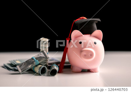 Save money for college, study finance, manage your bank accounts wisely and view education valuable investment requiring careful financial planning and saving. save, money, study, finance, education Save money for college, study finance, manage your bank accounts wisely and view education valuable investment requiring careful financial planning and saving. save, money, study, finance, education 126440703