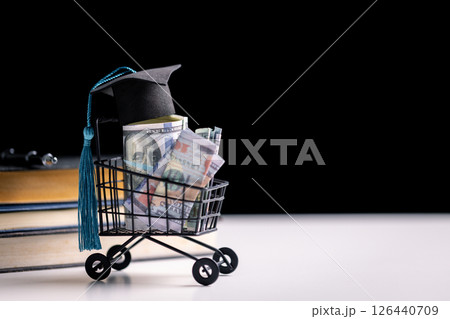 Save money for college, study finance, manage your bank accounts wisely and view education valuable investment requiring careful financial planning and saving. save, money, study, finance, education Save money for college, study finance, manage your bank accounts wisely and view education valuable investment requiring careful financial planning and saving. save, money, study, finance, education 126440709