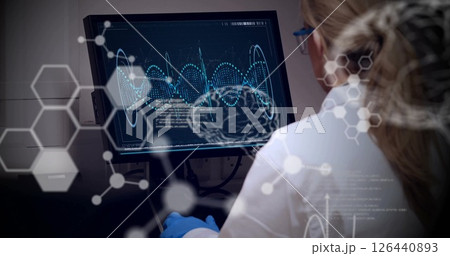 Image of scientific data processing over caucasian female scientist in laboratory Image of scientific data processing over caucasian female scientist in laboratory 126440893