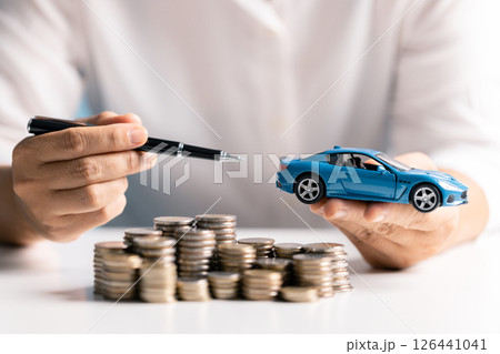 Saving money and managing coins wisely can help finance the cost of a car loan through banking and business strategies when you decide to buy. money, car, saving, coin, finance, loan, cost, business. 126441041