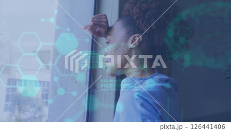 Image of data processing and chemical formula over biracial woman looking through window Image of data processing and chemical formula over biracial woman looking through window 126441406