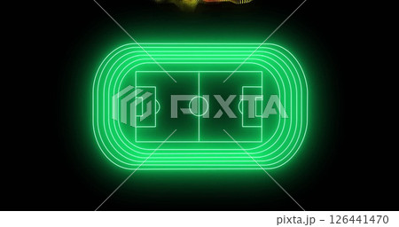 Image of yellow and red particle wave over green neon football stadium on black background 126441470