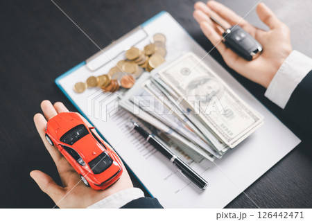 Concept business vehicle finance protection office plan investment buy sell car ensuring idea financial security. automobile agent hand protect purchase insurance and secure favorable loan deal. Concept business vehicle finance protection office plan investment buy sell car ensuring idea financial security. automobile agent hand protect purchase insurance and secure favorable loan deal. 126442471
