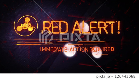 Image of red alert text with sign over light spots on black background 126443069