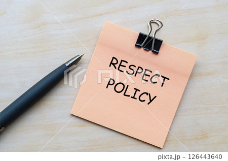 Respect policy text on pink notepad representing guidelines for ethical and respectful conduct Respect policy text on pink notepad representing guidelines for ethical and respectful conduct 126443640