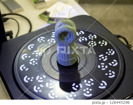3D Scanning object. Three-dimensional scanner with laser volumetric scanning surface of object for prototyping. High precision new innovation modern technology equipment. Science accuracy. 3D Scanning object. Three-dimensional scanner with laser volumetric scanning surface of object for prototyping. High precision new innovation modern technology equipment. Science accuracy. 126445296