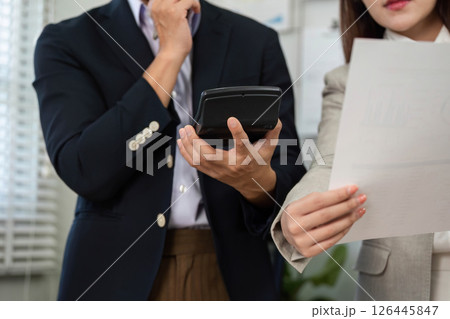 Business Consultation and Financial Planning. Professional discussing strategy with a client. 126445847