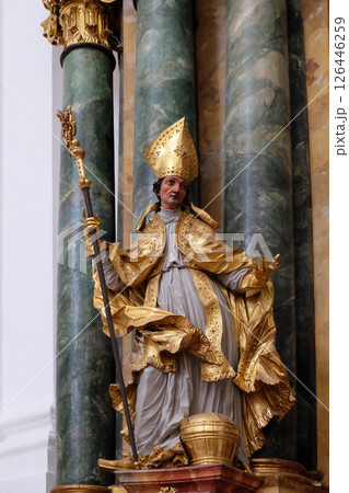 Statue of Saint, Altar in Collegiate church in Salzburg Statue of Saint, Altar in Collegiate church in Salzburg 126446259