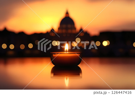 Vatican City, burning candle late at night with St. Peter's Basilica in the background, the death of the pope pontiff, grief and pain of loss 126447416