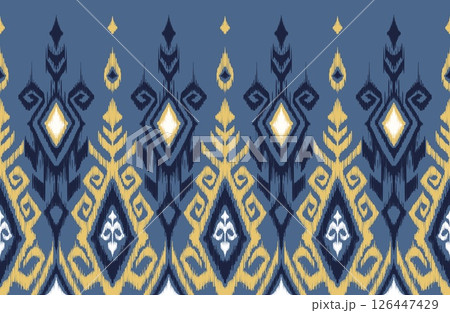 Abstract ethnic geometric blue and yellow Ikat Seamless pattern design 126447429