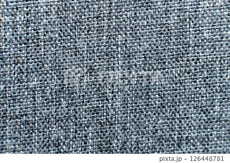 Close-up texture of textile surface. Extreme macro close-up of synthetic fabric surface. 126448781