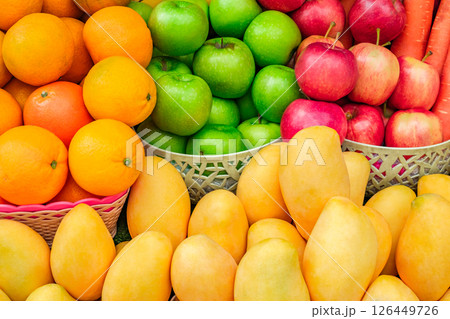 fruits and vegetables, mangoes, oranges, apples at the grocery market 126449726